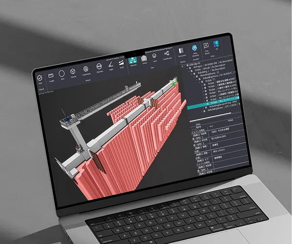 ノートPCでOpenAEC for Desktopを開き、橋梁モデルの3Dビューと属性情報を表示している様子
